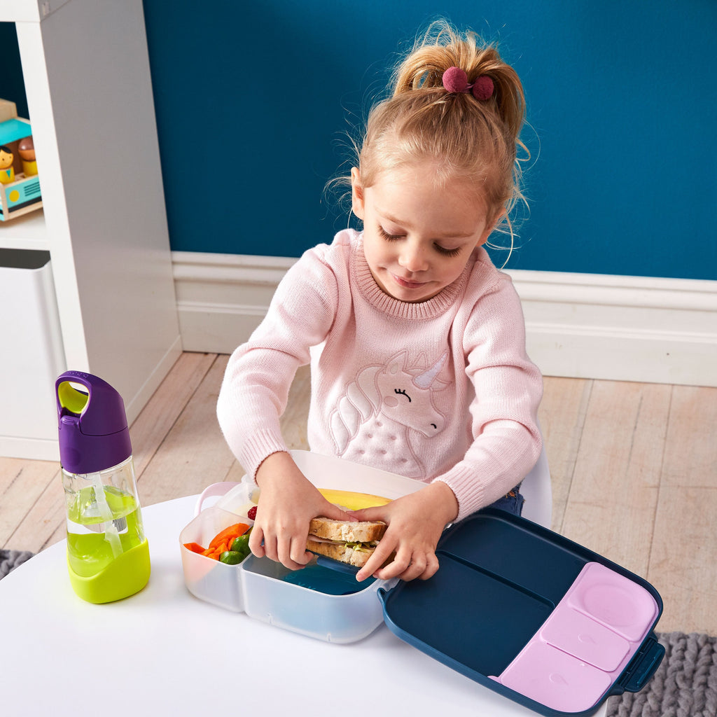 child with lunchbox - indigo rose - b.box for kids